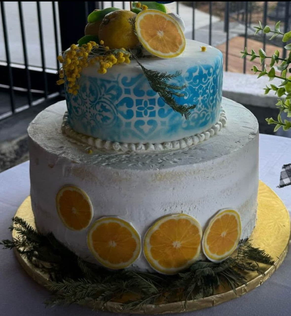 Lemon and blue two-tier garden cake