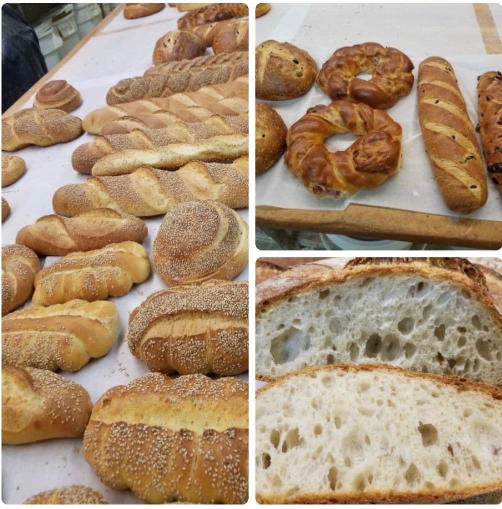 Assorted Italian breads, rolls, and sliced loaf